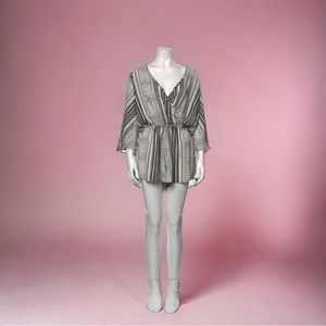 Elan Romper
Black & White Striped
Size Large